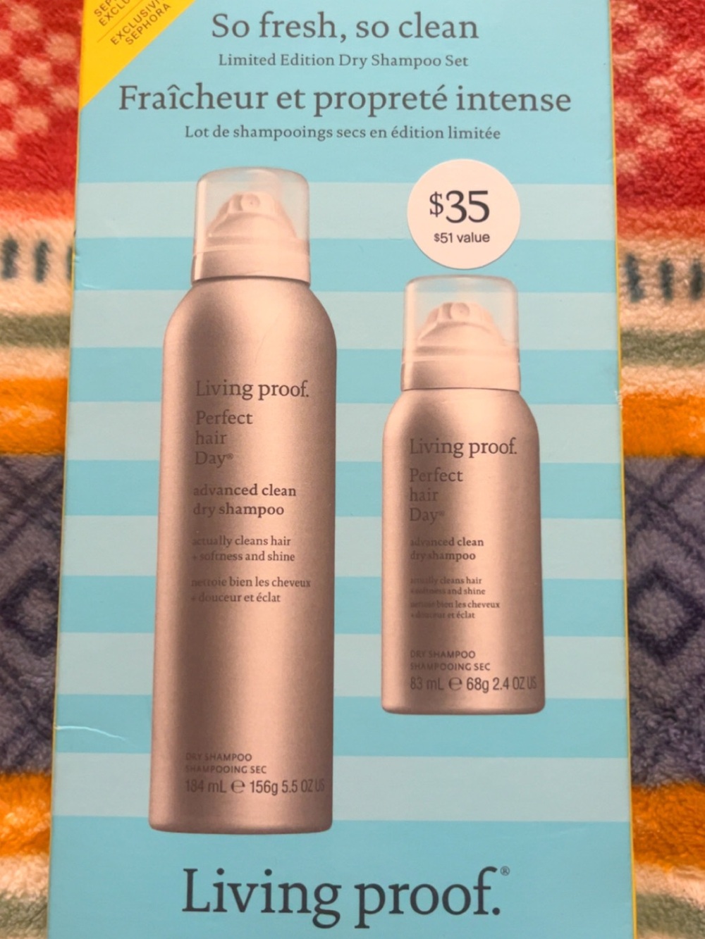 Living Proof dry shampoo set — silver bottles with teal packaging